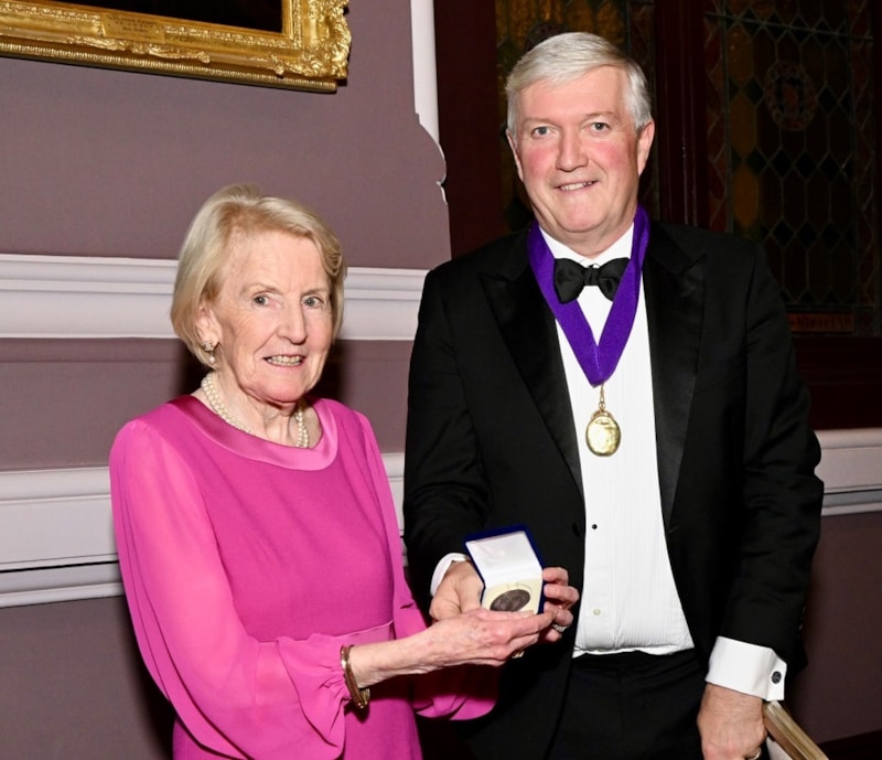 Professor Hilary Hoey pictured with RCPI President Dr Diarmuid O'Shea after receiving medal